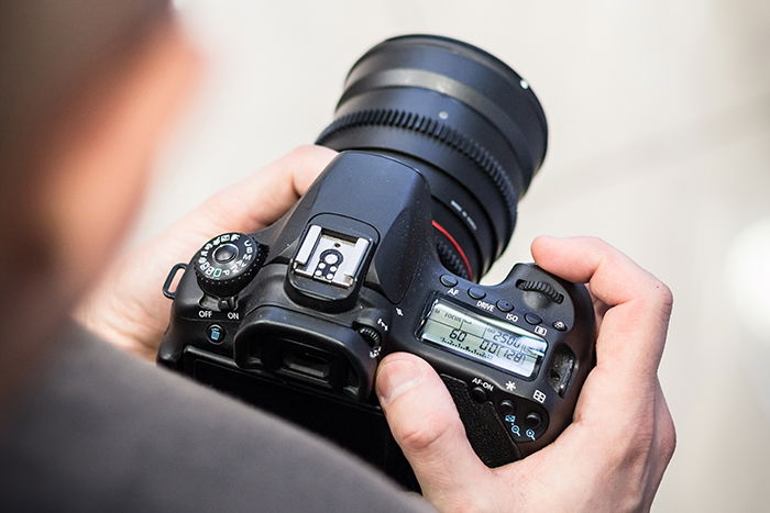 overhead photo of someone holding a camera