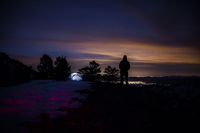 A camper watching the night sky