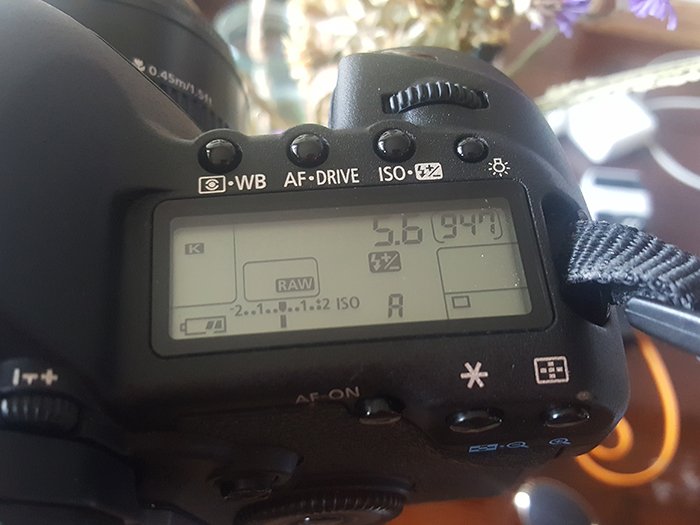 A close up of DSLR camera settings