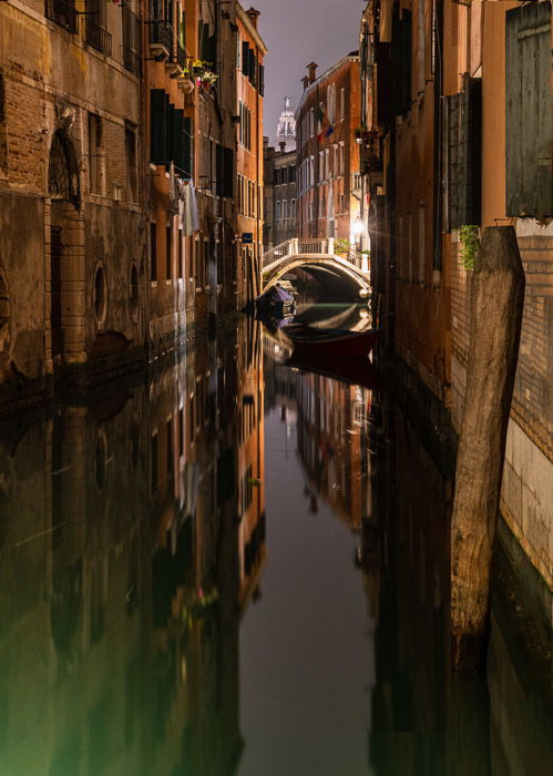 Closer crop of Venetian canal at night.