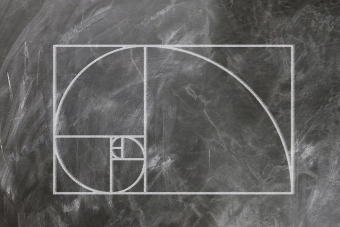 The Fibonacci or golden spiral drawn on a chalk board