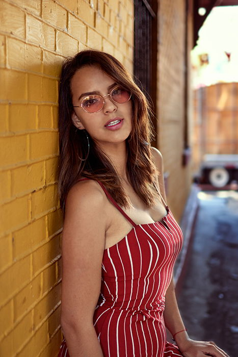 Female model posing for a portrait photo outdoors