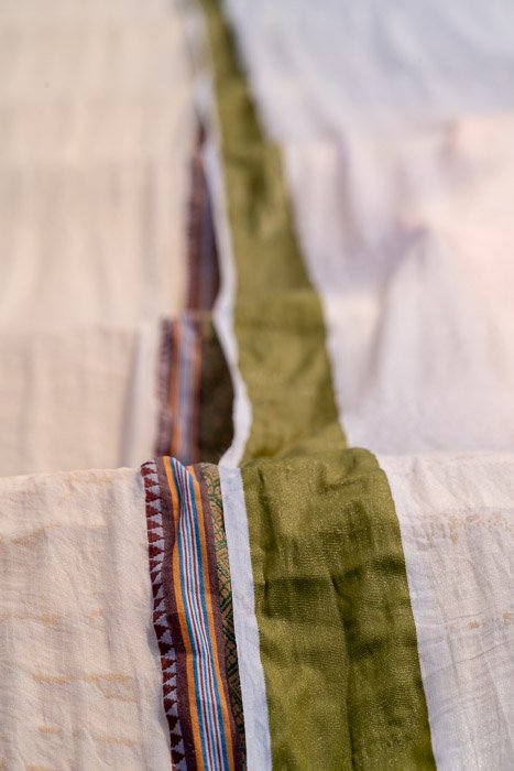 Close-up photo of a fabric with colorful stripes