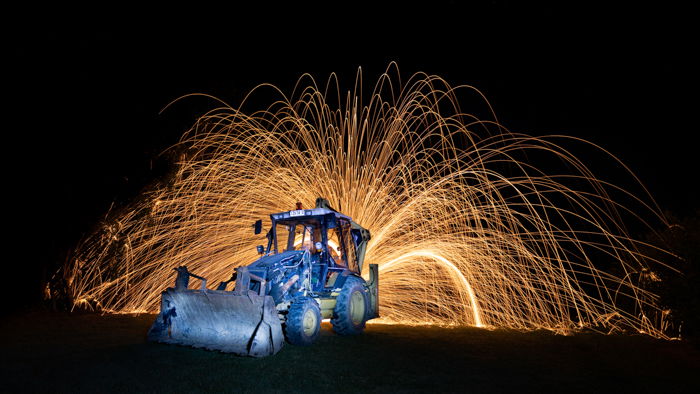 steel wool photography with a tractor in the foreground