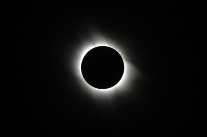 solar corona showing at total solar eclipse