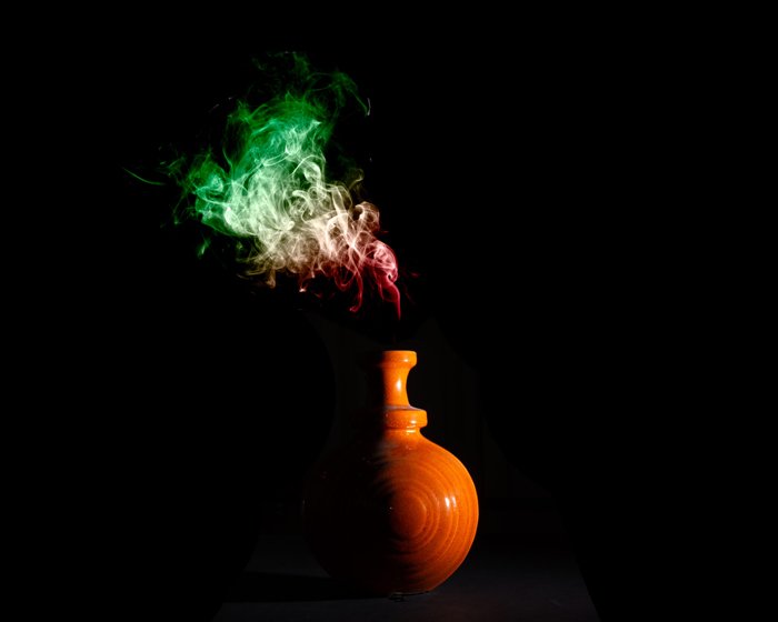 Photo of a vase with smoke coming out of it