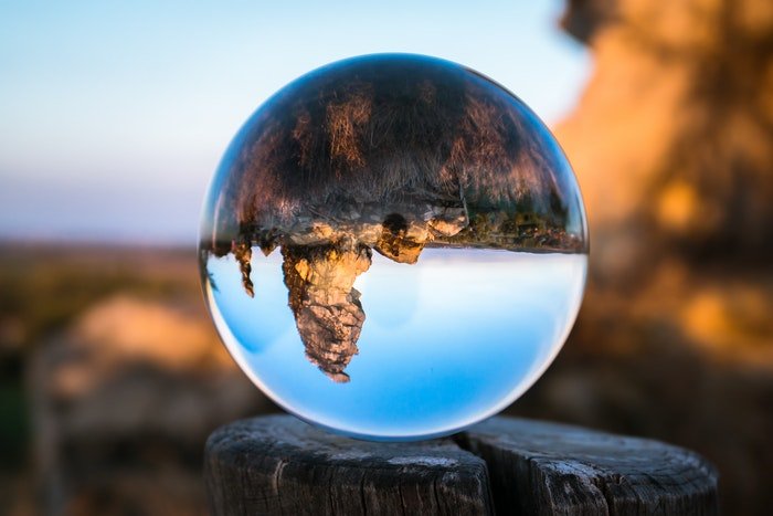 A rock formation shot through a crystal ball 