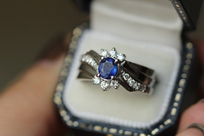 A sapphire ring in a box