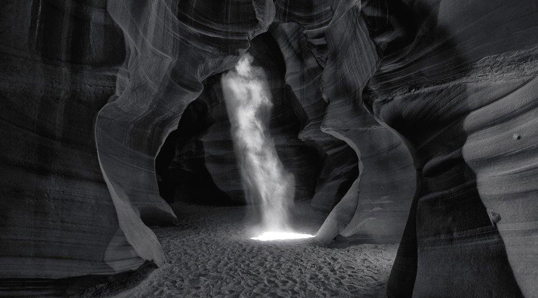 Phantom by Peter Lik of a canyon with light streaming into it as one of the most expensive photographs