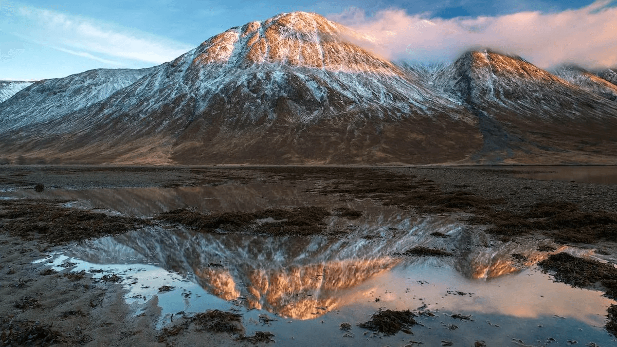 A mountain landscape with a reflection by one of the best nature photographers Thomas Heaton