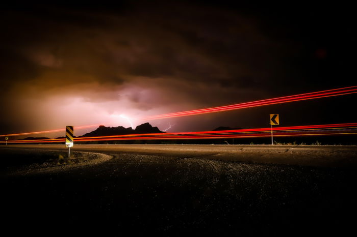 Streaming light trails on a highway at night