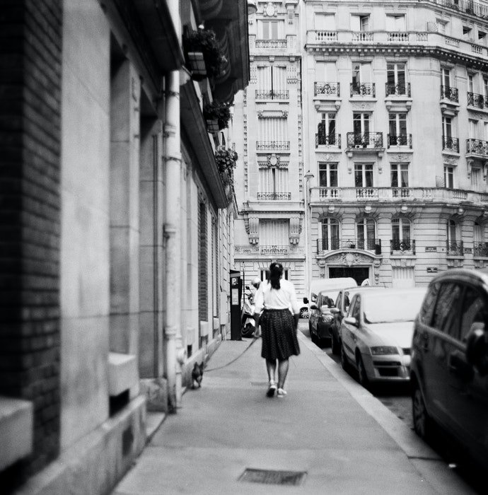 A black and white urban street scene