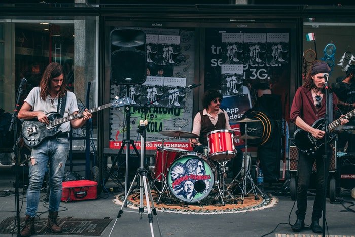 A rock band busking on the street