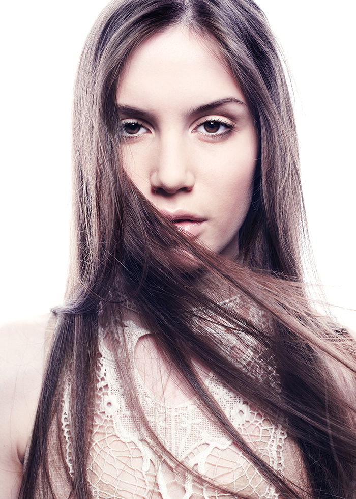 Fashion portrait of young beautiful elegant woman.