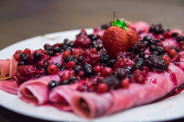 Close-up photo of pancakes with fruits