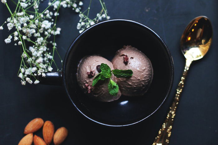 Flat lay photo of fruity ice cream and ingredients