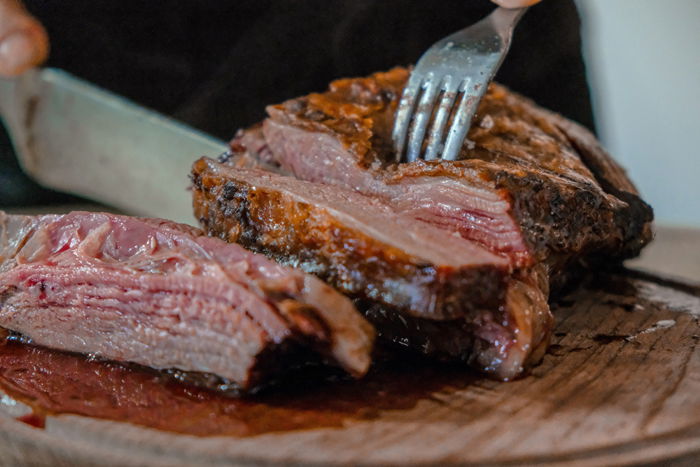 Cutting cooked meat