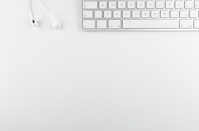 Minimalist stock photo of a white pc keyboard