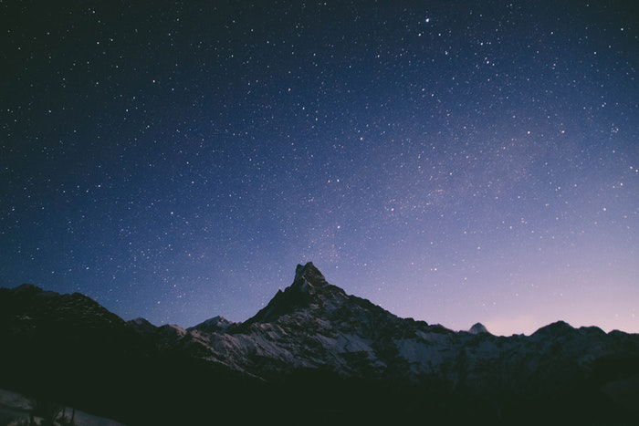 Impressive starry sky over a rocky landscape