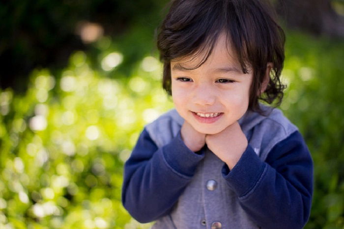 Close up portrait of a toddler outdoors