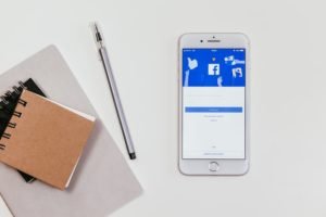 A smartphone with Facebook on the screen