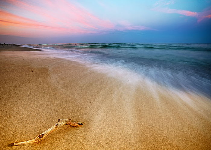 Magnificent long exposure landscape photography of sea sunset.