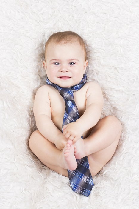 photo of a baby boy in a blue tie