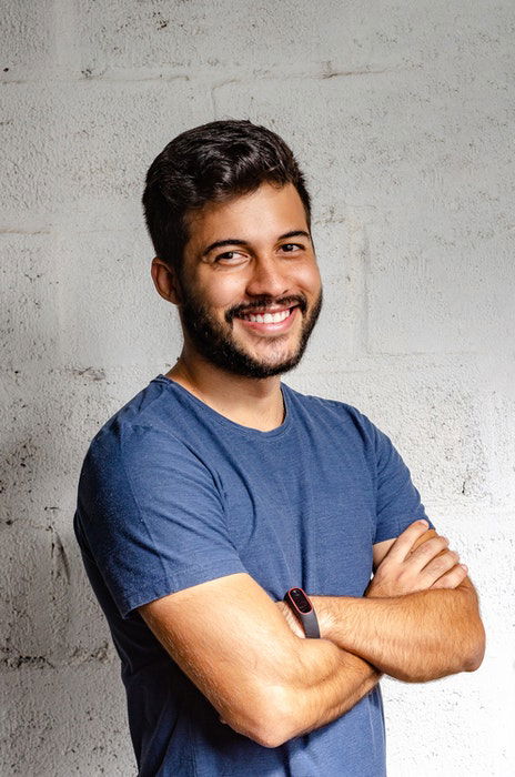 A smiling man posed for a headshot