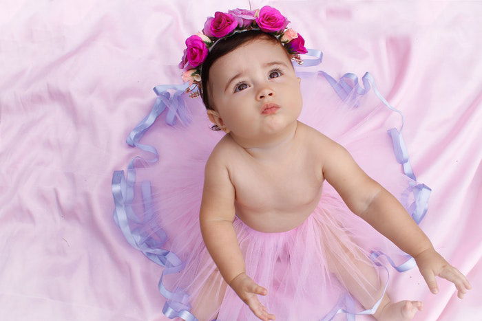 Sweet baby in flower wreath and tutu