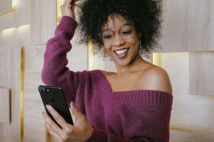 A young woman taking a selfie