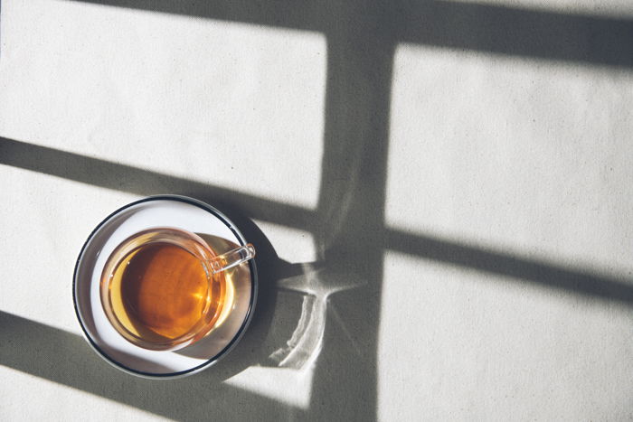 Overhead shot of a cup of tea on a table