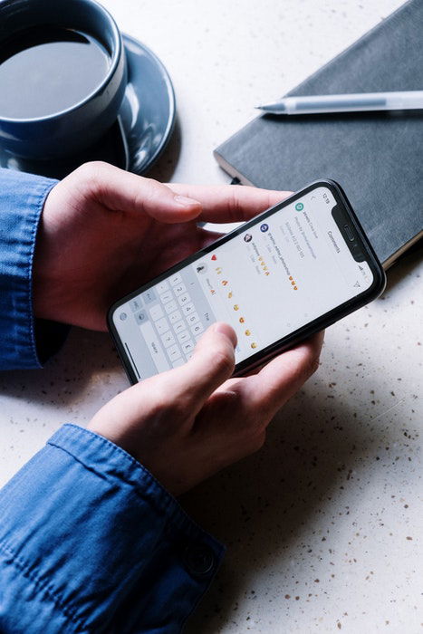 A close up of a person using a smartphone