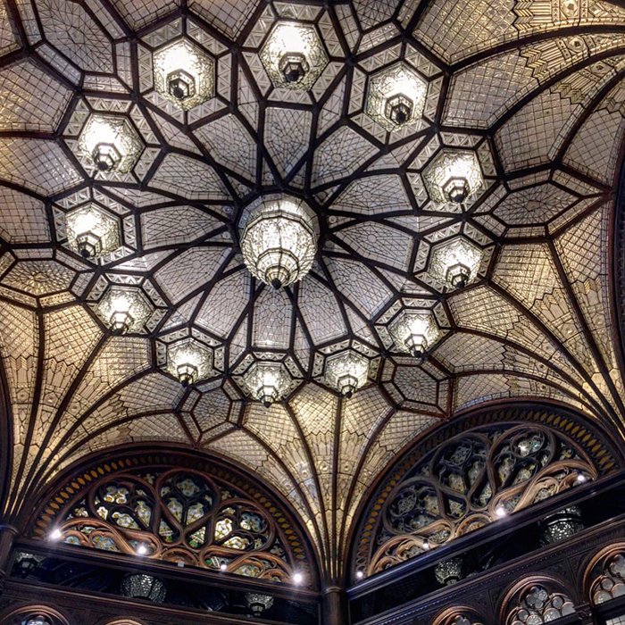 Ornate ceiling of a beautiful hotel lobby 