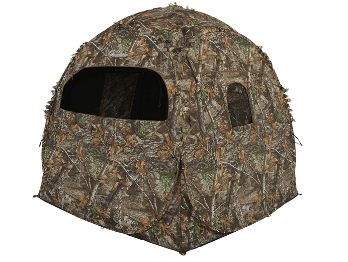 A camouflaged bird blind tent