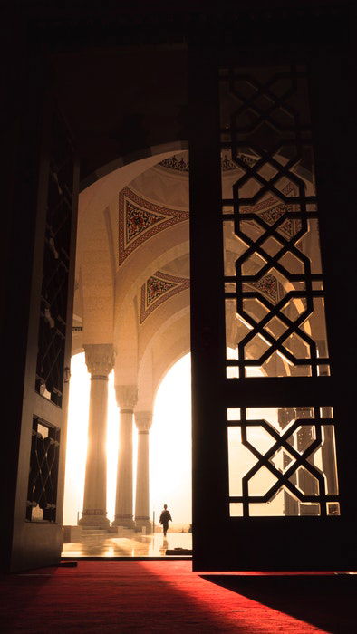 Image of interior architecture of large doors which are opened to create an interesting balance in the image