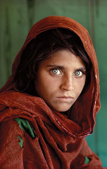 A portrait of a scared Afghan girl