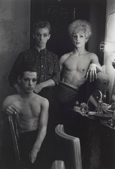 Three transvestites in a dressing room