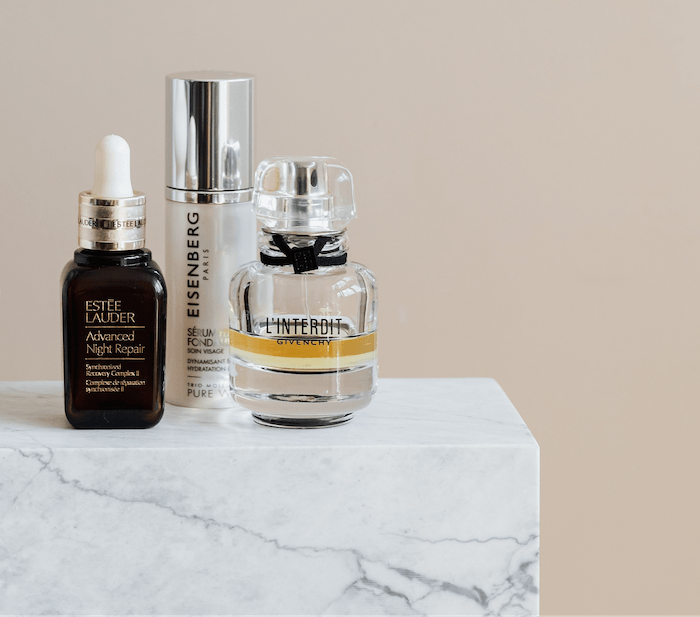 Product photography composition with three bottles