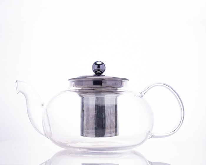 teapot with black stripe down metal surface