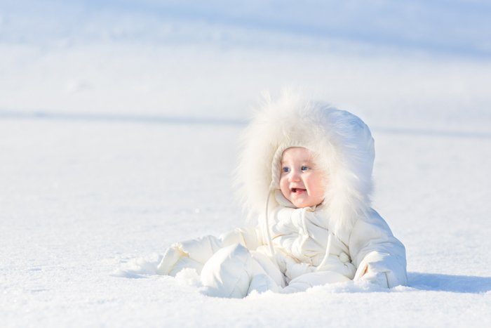 Sweet Christmas photo of a baby in the snow