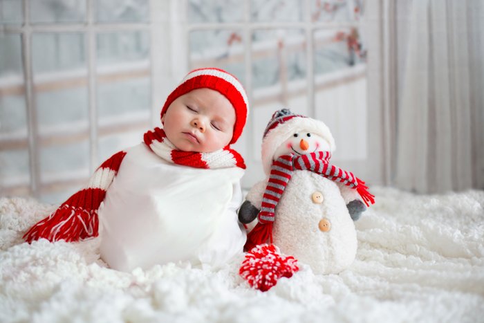 Sweet Christmas photo of a baby dressed as a snowman