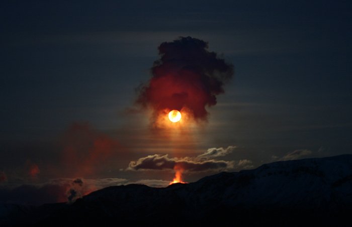 Perfectly timed photo of a volcano erupting