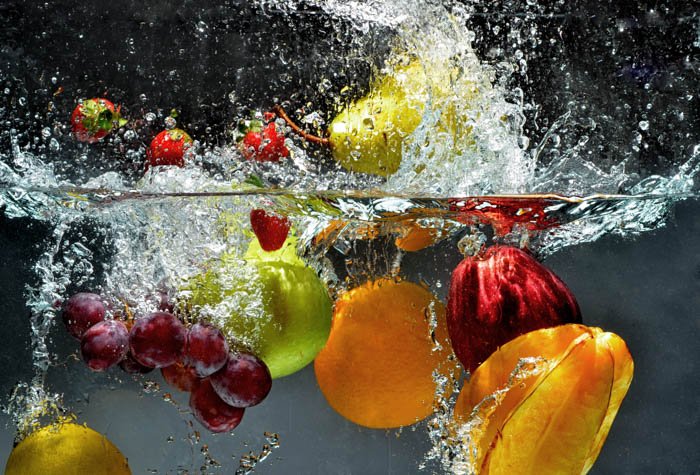 Fresh Fruit and Vegetables being shot as they submerged under water. 
