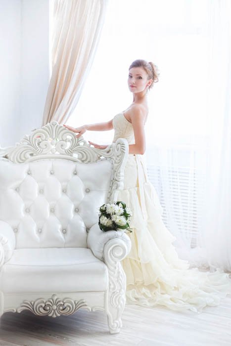 Image of a bride with curtain