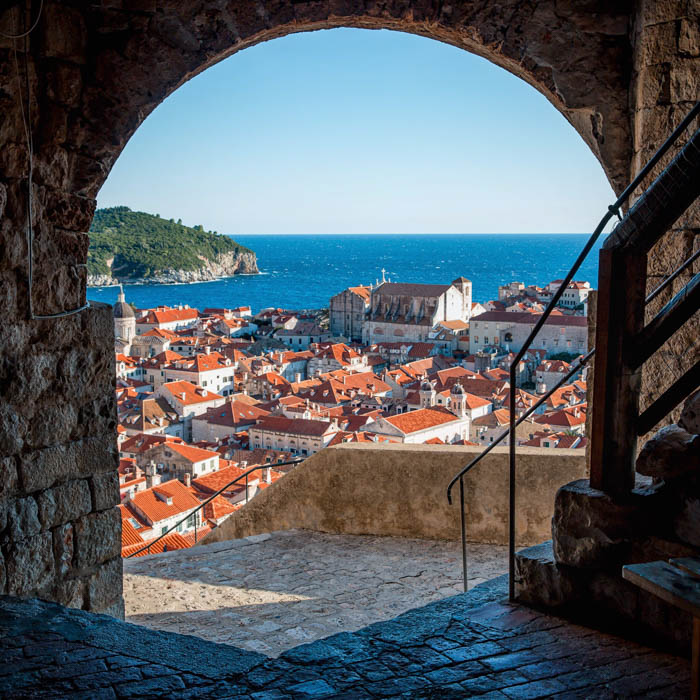 A travel photography image of a Mediterranean village by the seaside