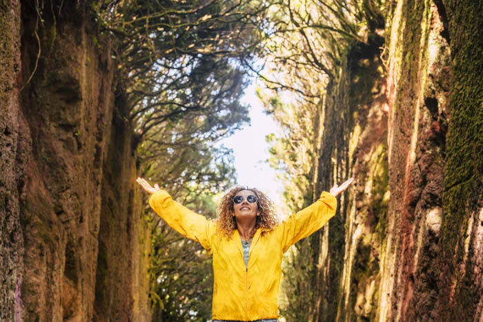 A self portrait image of a traveller in a forest