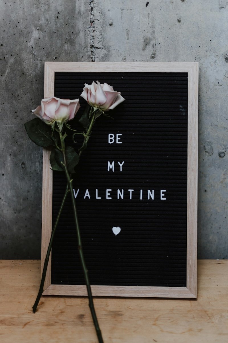 A letterboard and flowers for a Valentines day photoshoot idea