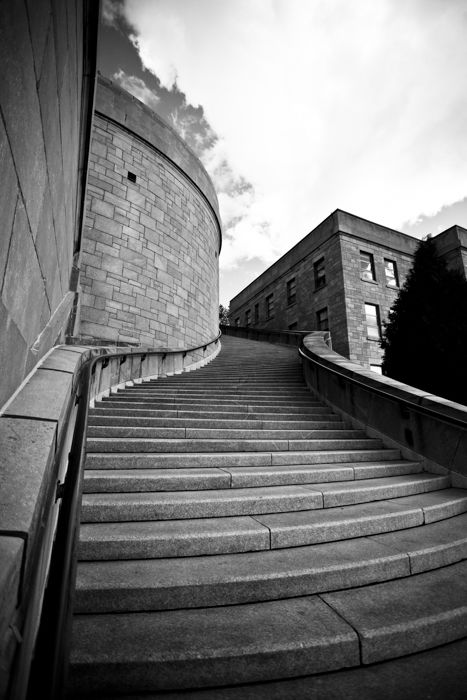 a photo of a stairwell show how to use leading lines photography