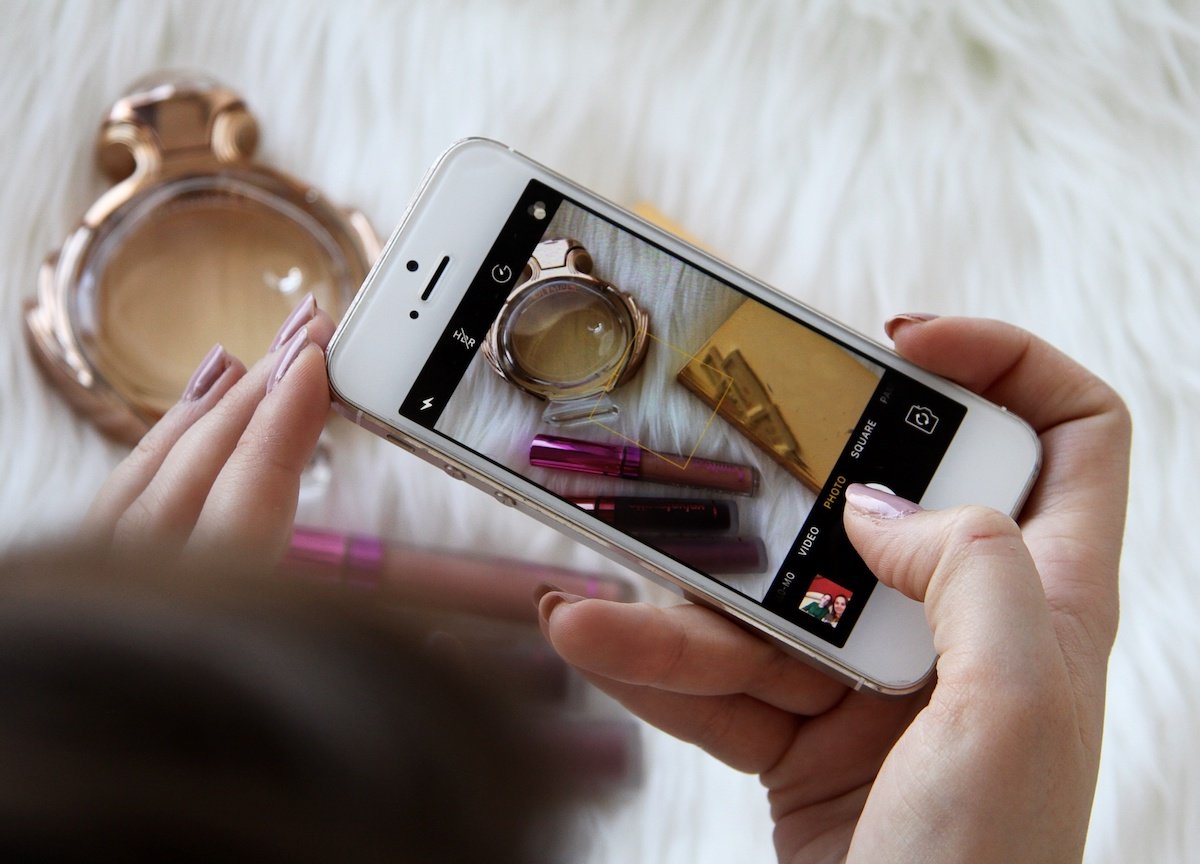 Beauty products being shot with an smartphone camera for DIY product photography
