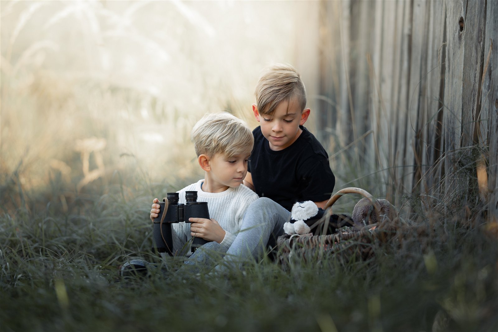 Photo of two children playing outdoors